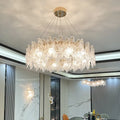 Crystal Pendant Chandelier illuminating a modern interior with elegant design and shimmering crystal.